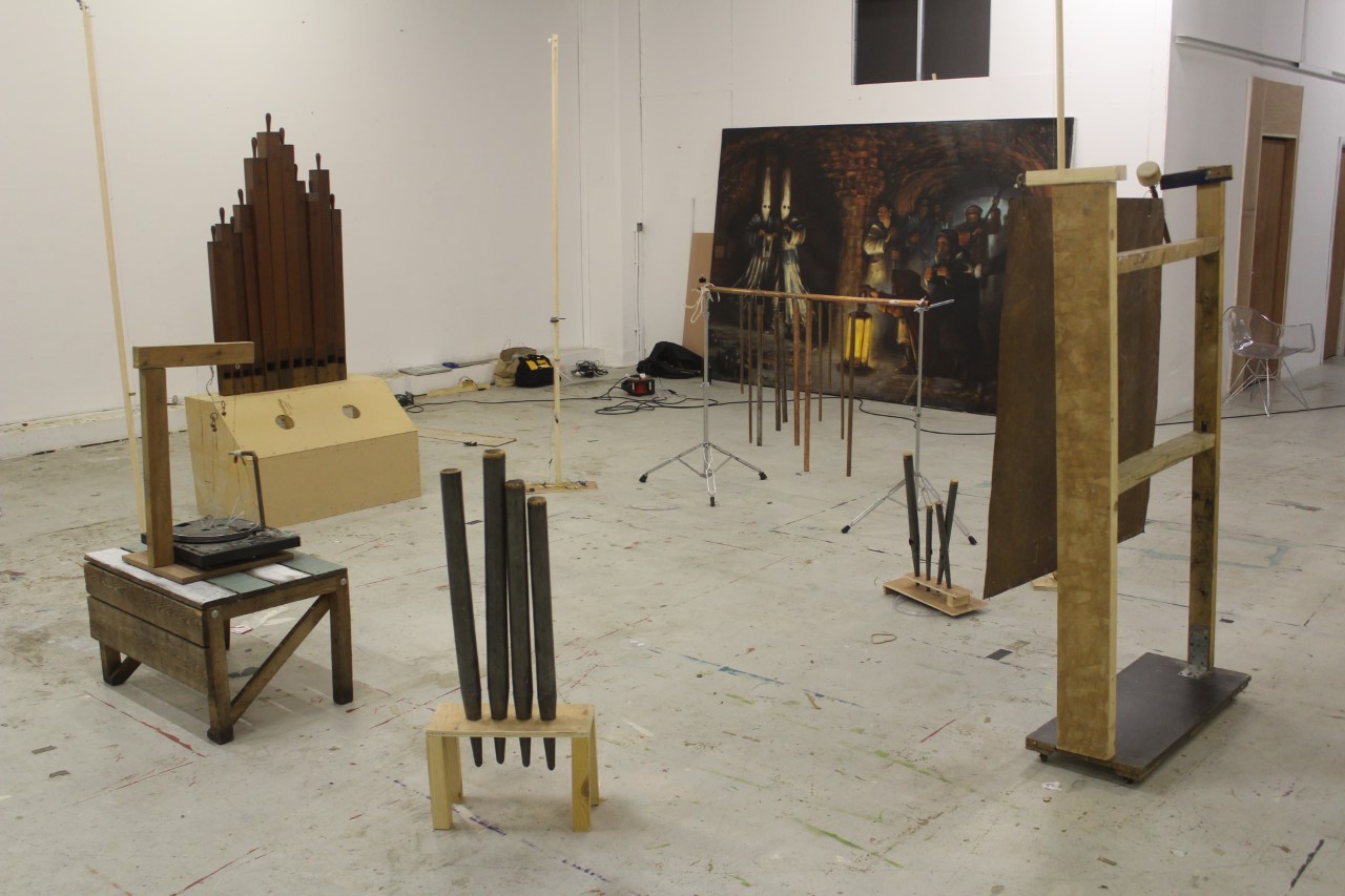 installation of pipes, wood, metal and a record player