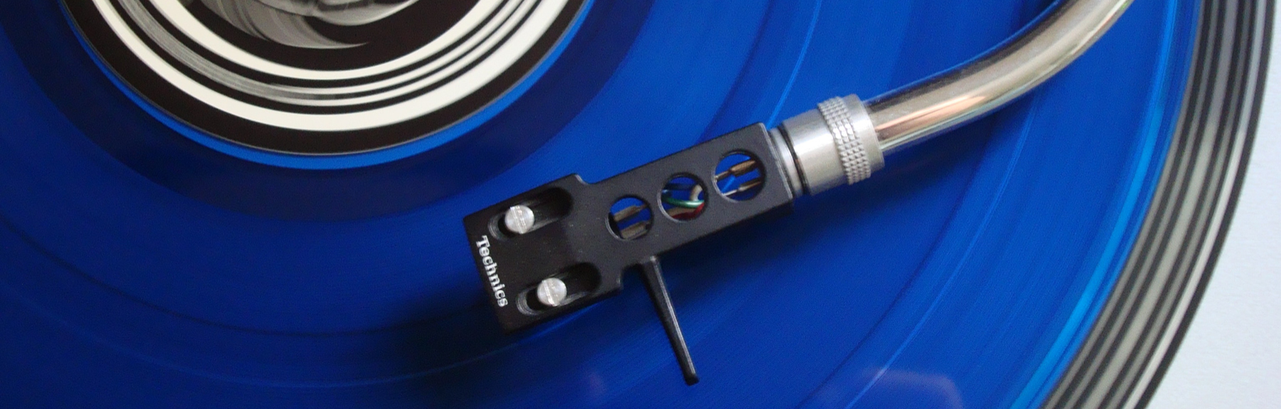 A record player playing a blue record
